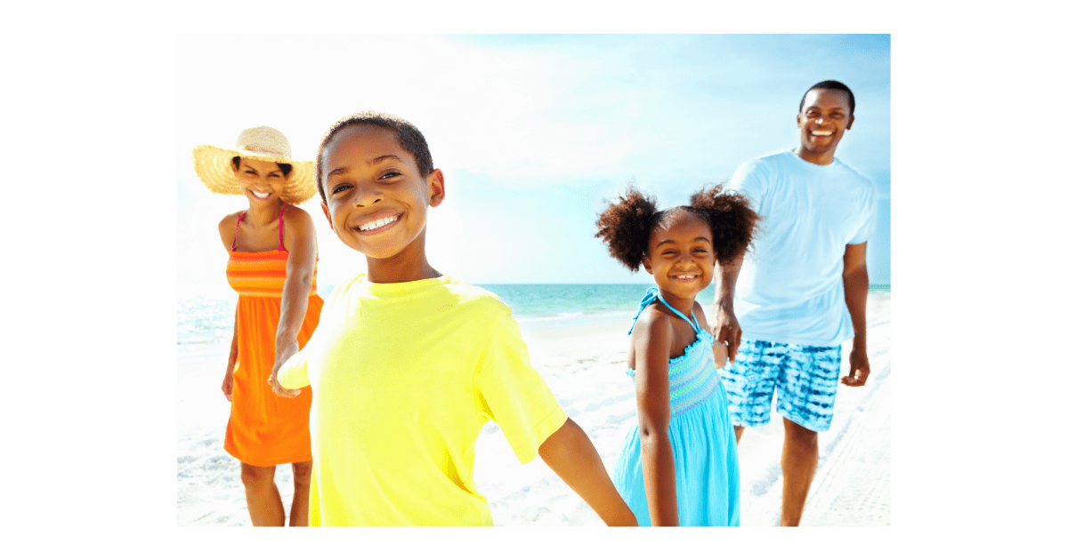 Happy family on a vacation at the beach