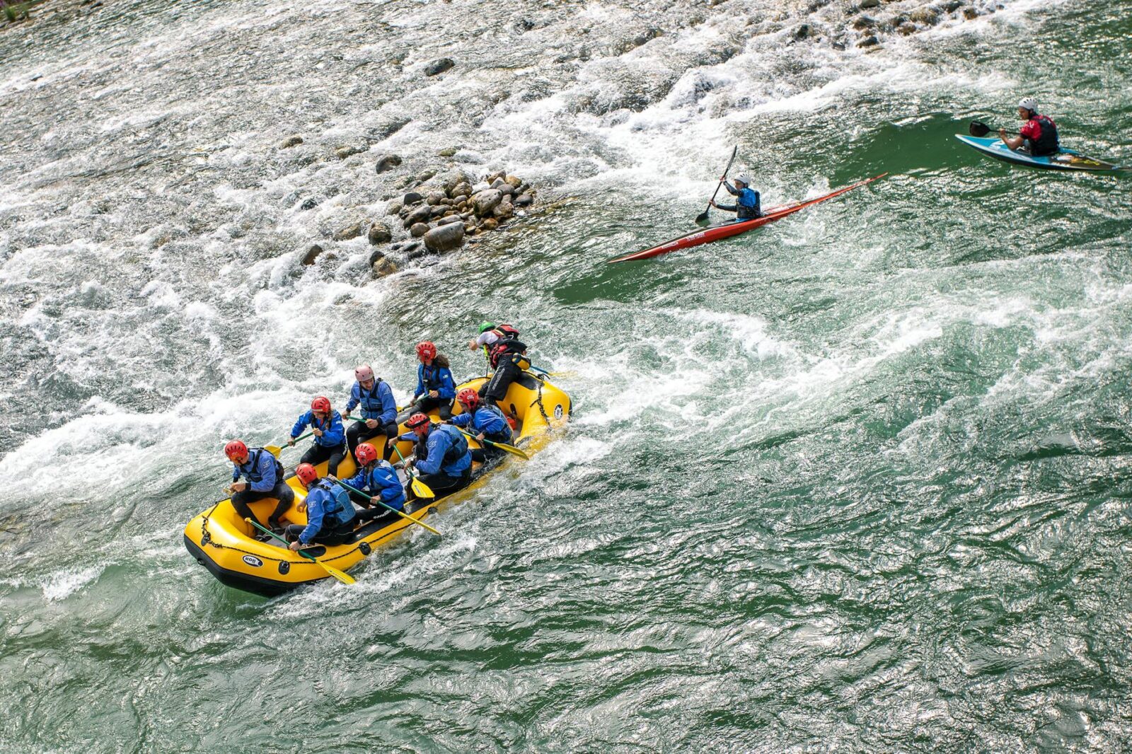 pontoon and kayaks on the river